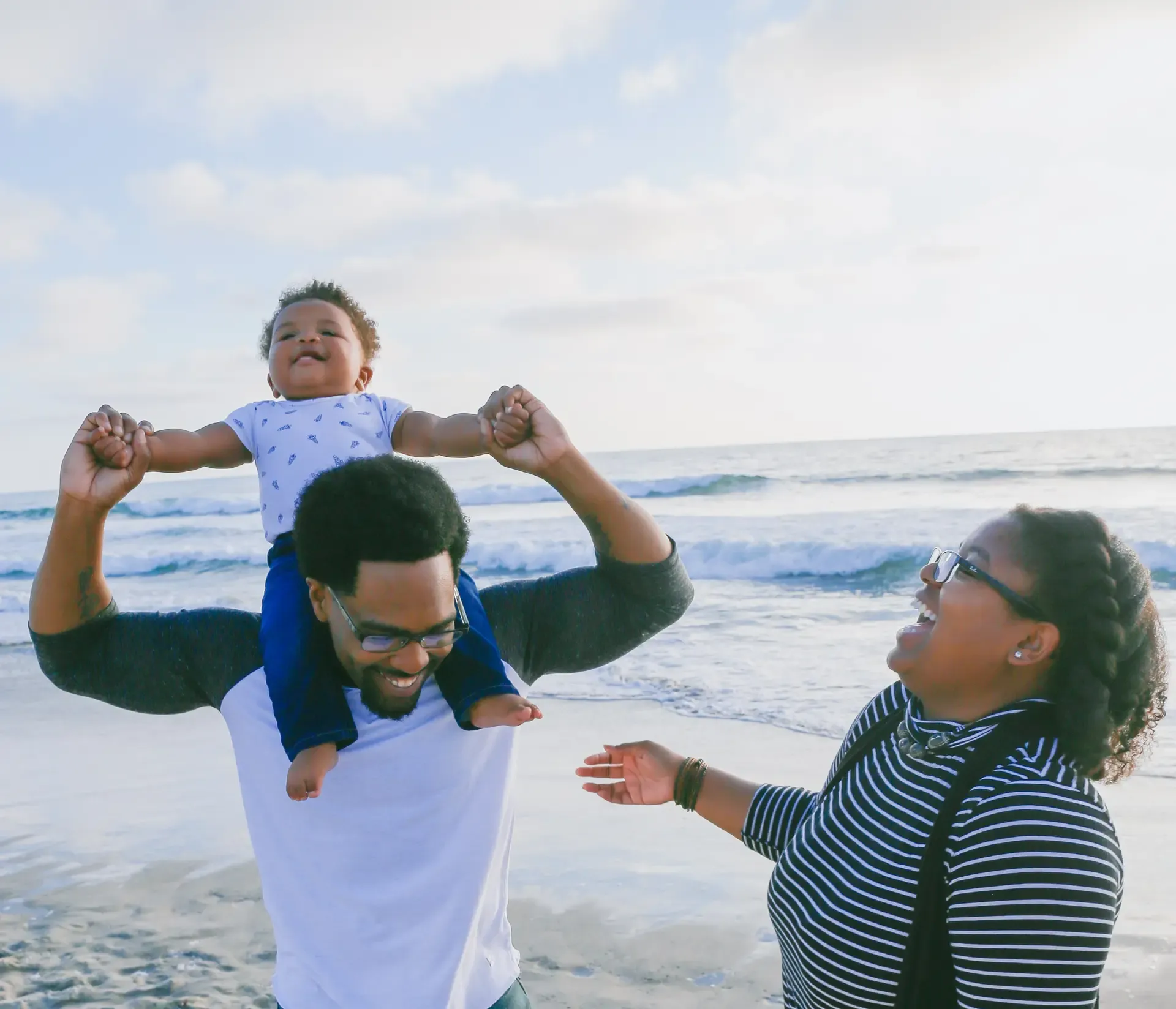 Family enjoying time together on the beach